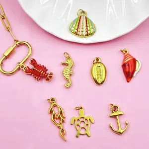 Colorful stainless steel ocean theme charms set including shell, sea turtle, and lobster pendants.