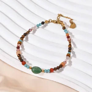 Exquisite vintage beaded bracelet featuring natural tiger eye and green stone details