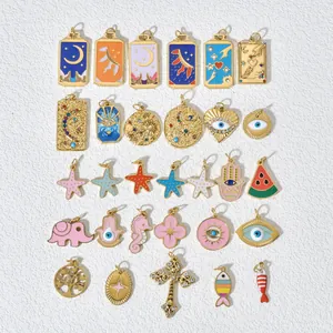 Collection of 18K gold plated stainless steel DIY charms featuring evil eye and sea life motifs