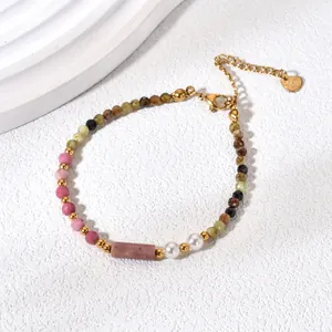 Detailed view of colorful natural stone bracelet featuring rhodochrosite and pearls
