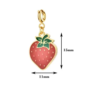 Macro detail of the red strawberry enamel pendant showing 15mm x 11mm dimensions