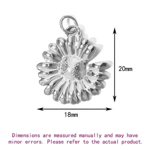 Macro view showing 18mm by 20mm dimensions of the polished silver daisy pendant