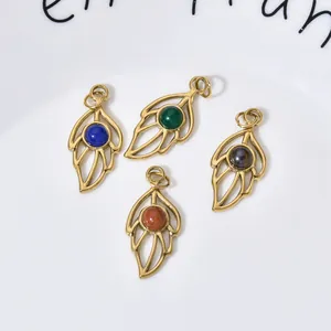 Macro view of four leaf-shaped stainless steel pendants with colored natural stones.
