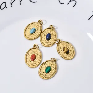 Detailed view of 18K gold plated stainless steel oval pendants with colorful natural stones