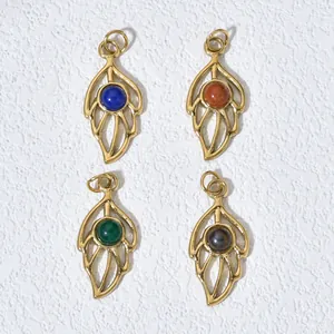 Detailed view of four 18K gold plated leaf pendants set with colorful natural stones.