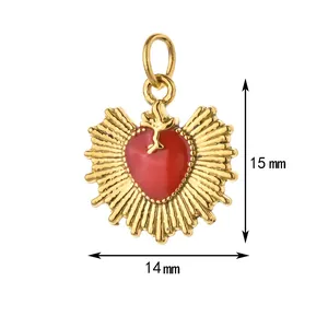 Close-up of gold-plated stainless steel heart pendant with red enamel, 15x14 mm