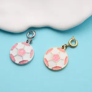 Pink and white glitter enamel soccer ball charms in gold and silver metal finishes