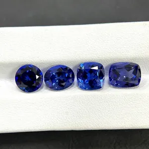 Royal blue lab-grown sapphire loose stones in round, oval, and cushion cuts