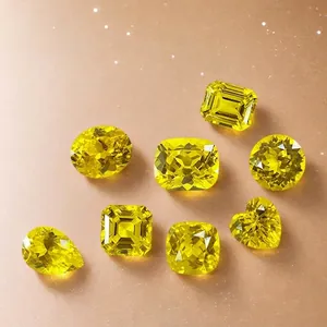 Loose yellow lab-grown sapphire gemstones in various shapes like heart, round, and emerald cut