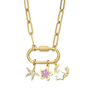 Close-up of gold stainless steel necklace with starfish, flower, and moon charms
