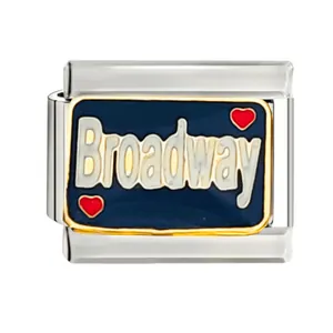 Close-up of Broadway and red heart pattern on blue enamel Italian modular charm