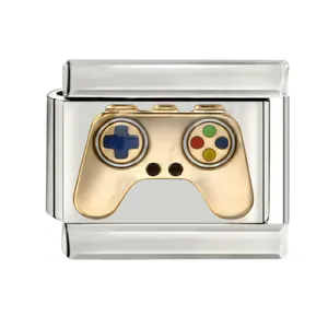 Close-up of stainless steel Italian bracelet charm with golden game controller detail