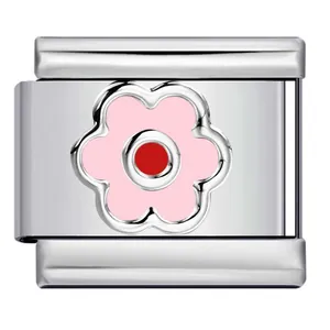 Close-up of polished silver modular bracelet link with pink flower and red center