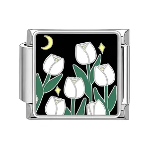 Detailed view of stainless steel Italian charm link with white tulip and moon pattern