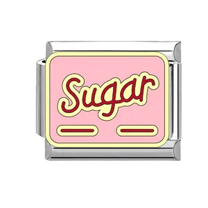 Detailed view of a pink enamel Italian link bracelet charm featuring 'Sugar' text design