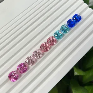 Lab-grown cushion cut colorful gemstones in vibrant shades of pink, blue and teal