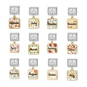 Detailed view of twelve Italian modular charm links featuring various monthly motifs.