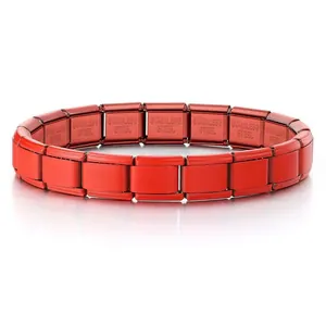 Close-up of a matte red Italian modular charm bracelet in stainless steel metal