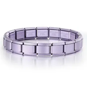 Detail view of a matte lavender purple stainless steel Italian modular charm bracelet.