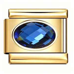 Detailed view of a gold stainless steel Italian charm link featuring a blue zircon.