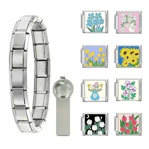 Detailed view of stainless steel modular charms with various floral enamel patterns