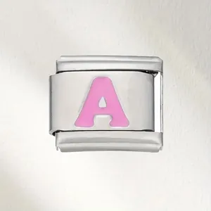Close-up macro detail of stainless steel Italian charm with pink enameled letter A design