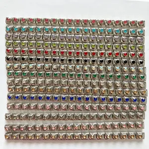 Collection of heart-shaped Italian charms with colorful zircon stones in various rows