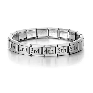 Detail of stainless steel Italian charm bracelet with numbered links 1st to 6th.
