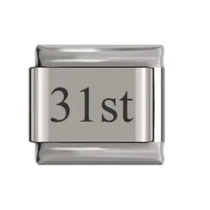 Macro view of a stainless steel Italian charm module with 31st engraving for DIY bracelets
