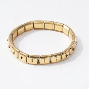 Bracelet à breloques modulable italien en acier inoxydable doré à crochets.