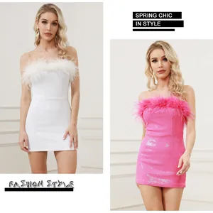 Elegant strapless sequin mini dress with ostrich feather trim for chic party style.