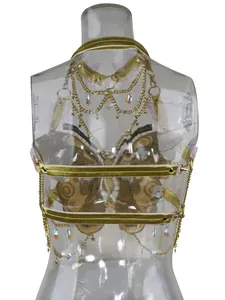 Top a farfalla ricamato sexy con catene metalliche dorate e ciondoli a stella in cristallo