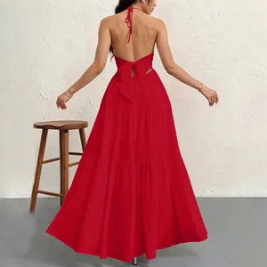 Back view of elegant red halter neck backless tiered maxi dress with bow tie detail