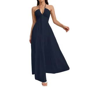 Elegant navy blue halter neck tiered maxi dress with V-neckline on white background