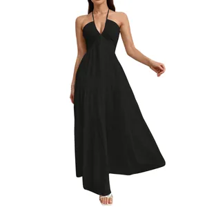 Elegant black halter neck tiered maxi dress shown on model against white background