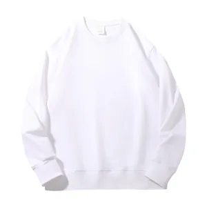 Close-up of a plain white crewneck sweatshirt featuring ribbed cuffs and a matching hem