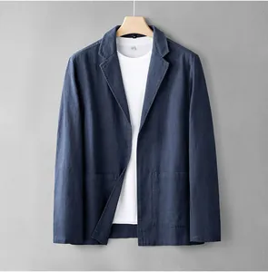 Close-up detail view of a minimalist lightweight blue linen casual blazer for men