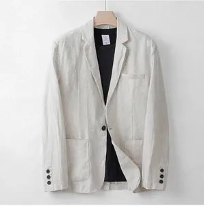 Detailed view of a men's beige linen casual blazer with notch lapels and patch pockets