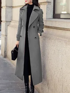 Detailed view of a slim-fit grey long wool coat for women with double-breasted buttons