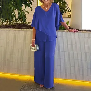Elegante conjunto de dos piezas azul para mujer con top de cuello en V y dobladillo