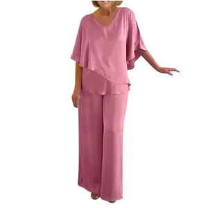 Elegante conjunto casual de dos piezas rosa con top de cuello en V y pantalones anchos