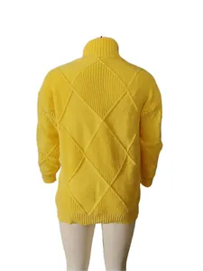 Rear view of yellow turtleneck knit sweater with diamond grid pattern on a mannequin