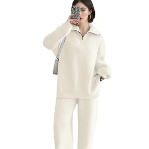 Elegant white cashmere knit two-piece set with half-zip sweater and wide-leg pants