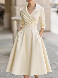 Elegant off-white V-neck midi dress with lapel collar and pleated waist detail.