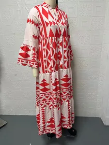 Full detail of the red and white geometric print bohemian tiered maxi shirt dress