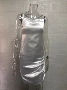 Elegant white satin cowl neck dress with delicate spaghetti straps and ruched side.