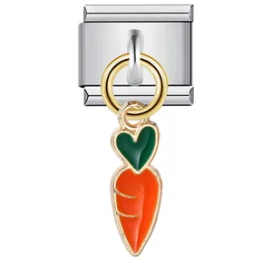 Close-up detail of heart-shaped carrot charm on a stainless steel Italian modular link