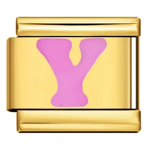 Detail view of golden Italian charm link with pink enameled letter Y