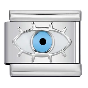 Detailed macro view of an Italian charm link featuring a blue enamel evil eye design