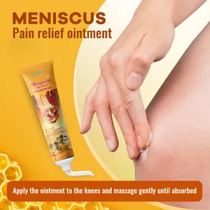 Detailed view showing application of bee venom joint relief ointment on human knee